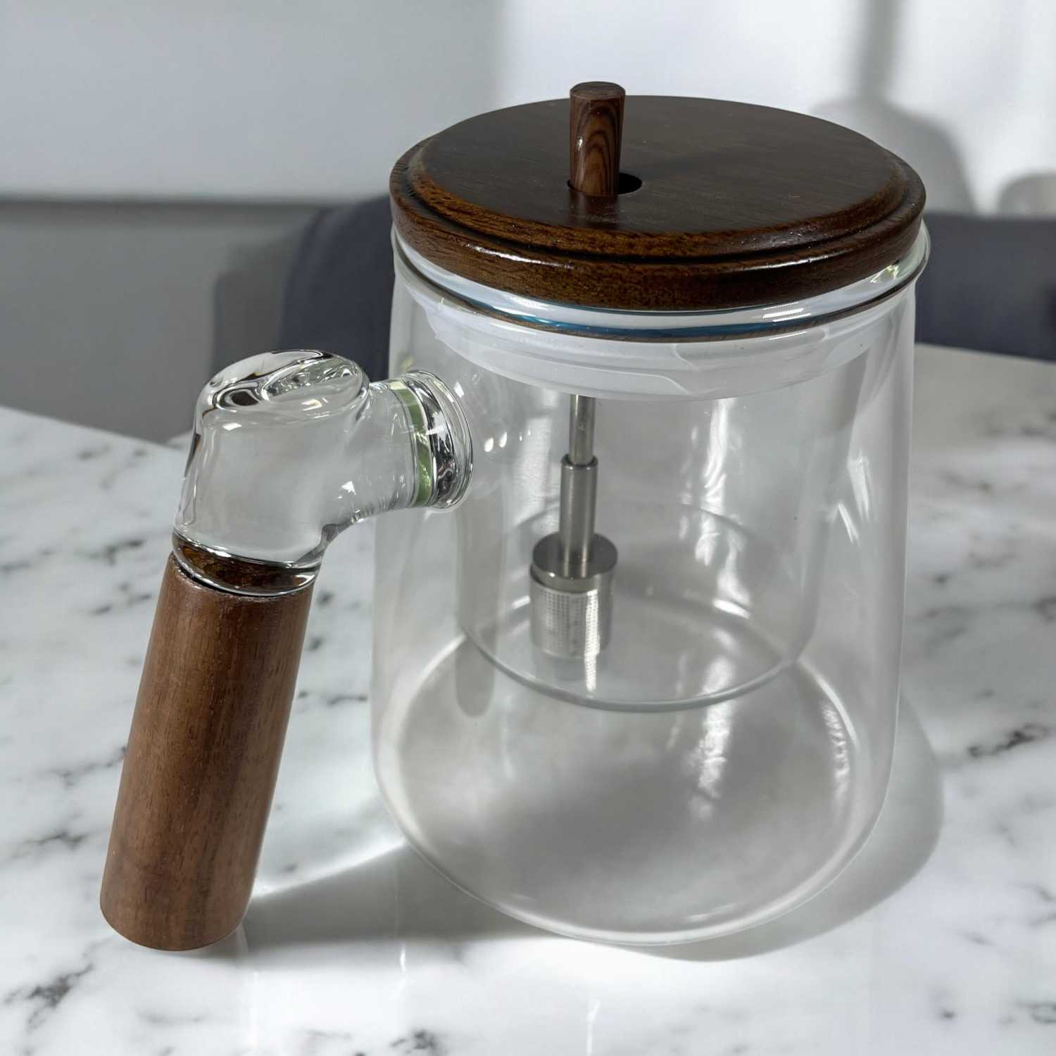 ginee_20260226165322129_2303520199.jpg One Two Cups Teko Teh Kaca Saringan Tahan Panas Infuser Teapot 650ml - HP13