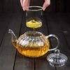 ginee_20260714150130733_2167292105.jpeg One Two Cups Teko Teh Kaca Saringan Tahan Panas Api Glass Teapot 600ml - AP-600