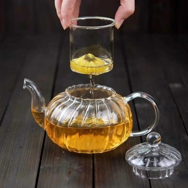 ginee_20260714150130733_2167292105.jpeg One Two Cups Teko Teh Kaca Saringan Tahan Panas Api Glass Teapot 600ml - AP-600