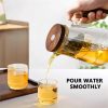 ginee_20260930142306470_7722170498.jpeg One Two Cups Teko Teh Kaca Saringan Tahan Panas One Click Filter 800ml - ML-8