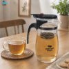 ginee_20260930162307495_5432229090.jpeg One Two Cups Teko Teh Kaca Borosilikat Saringan Tahan Panas Teapot - TP-758 - 874ML